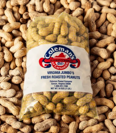 Bag of Coleman's fresh roasted in-shell peanuts on a bed of peanuts